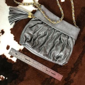 Silver purse with gold chain